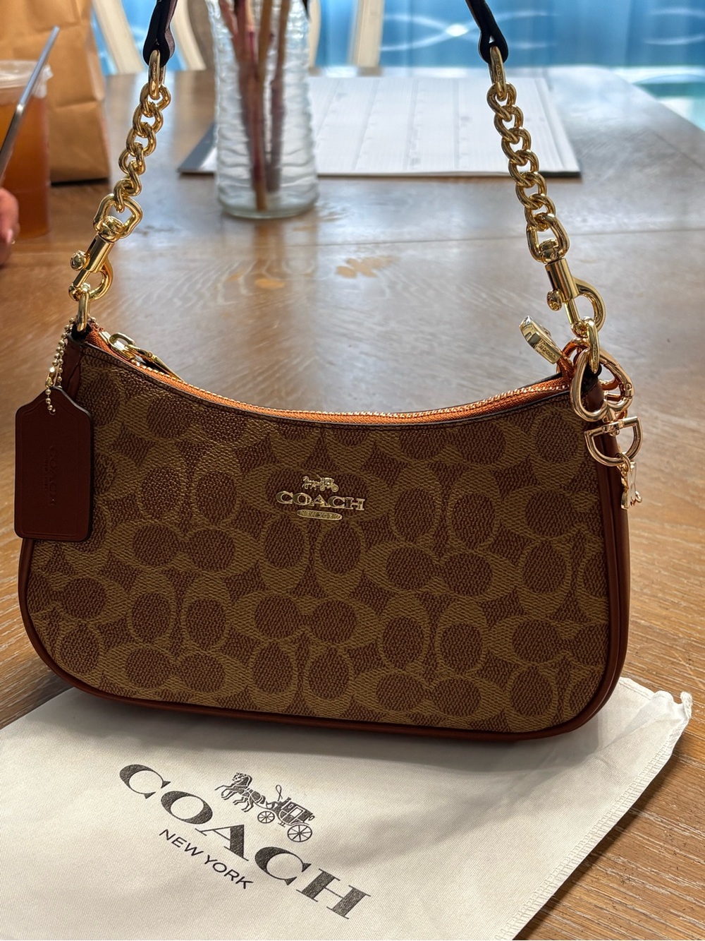 COACH Brown Signature Canvas Shoulder Bag with Gold Hardware and Chain Strap